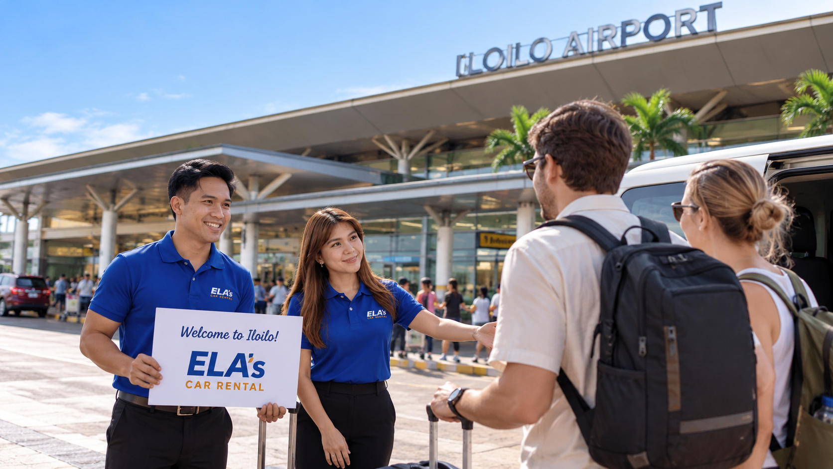 ELA's staff with a welcome sign greeting travellers outside Iloilo Airport